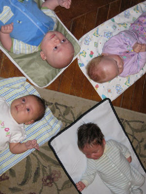 four happy babies