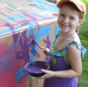 happy girl painting